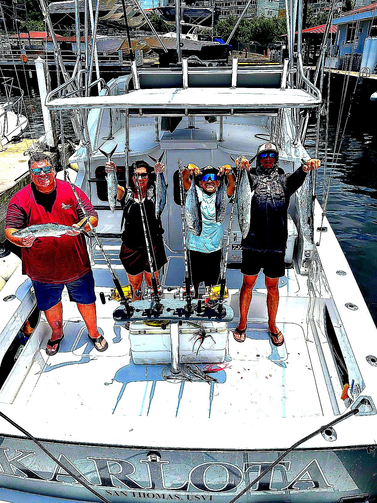 Group of anglers with their fishing catches on the Bertram 31