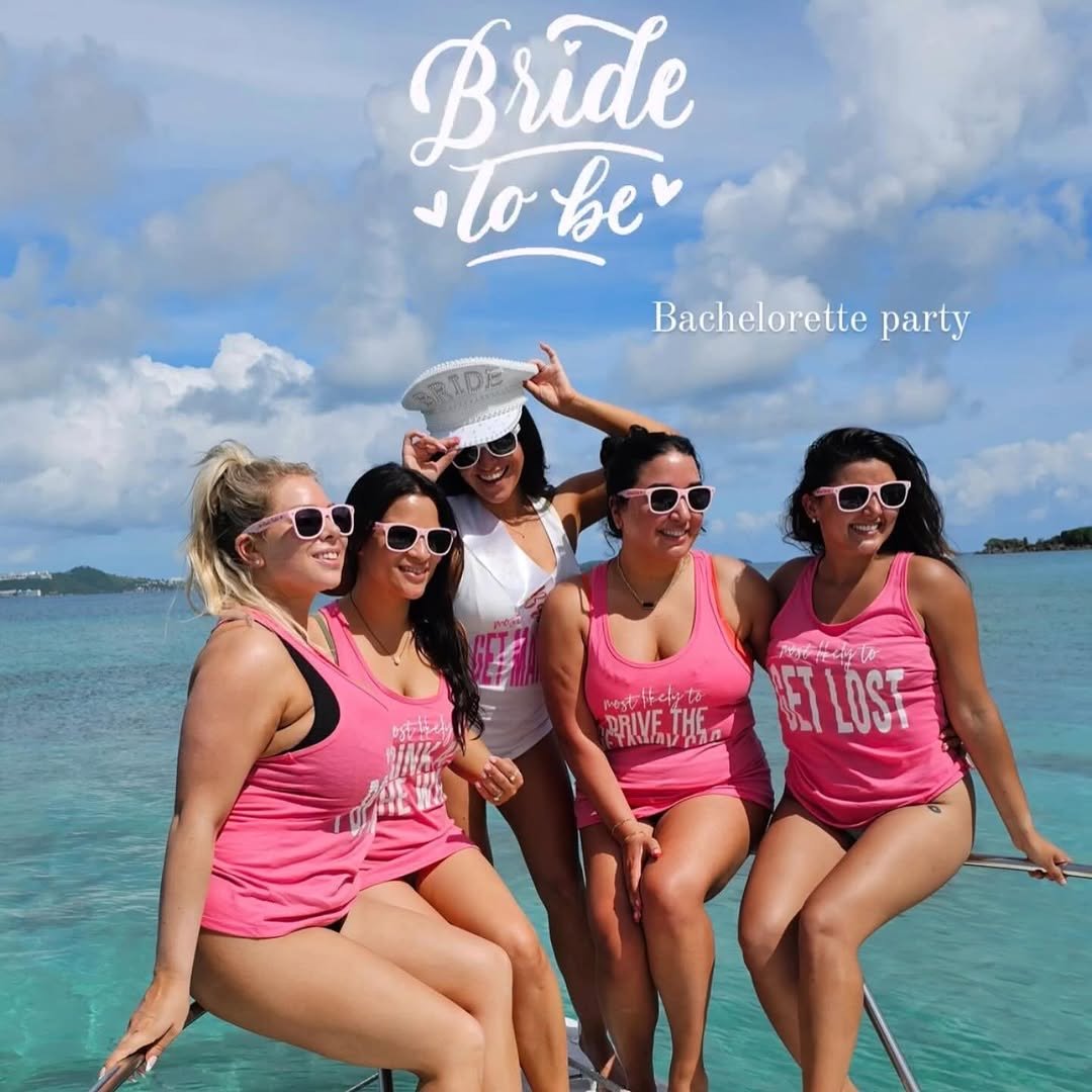 Bachelorette party girls in pink shirts with bride in white sash