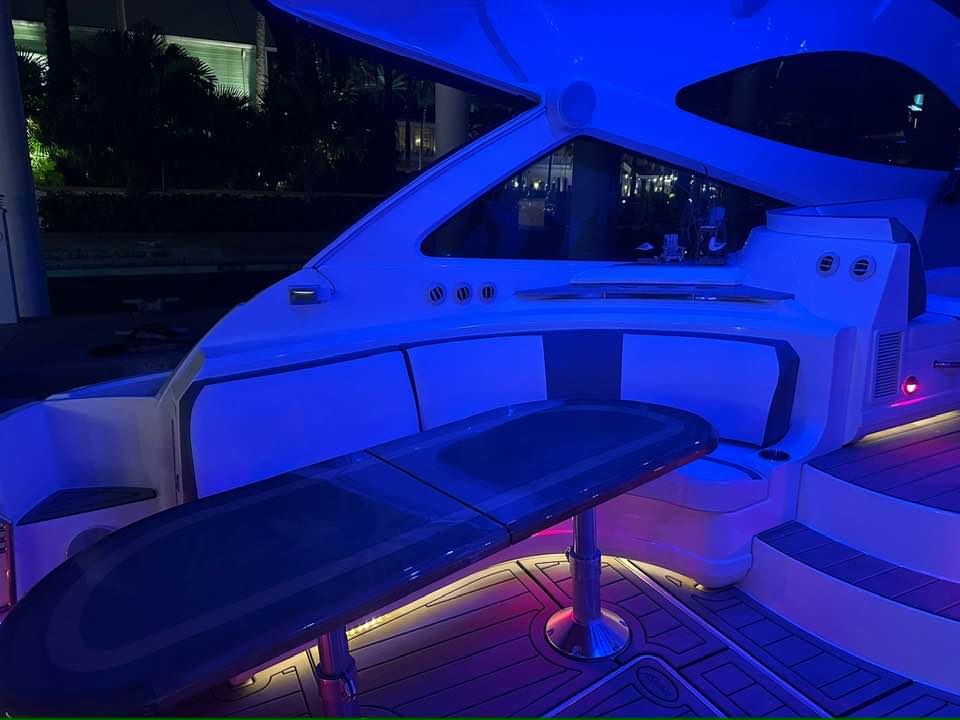 Cruiser Yachts 60 aft deck with blue LED mood lighting for sunset charters