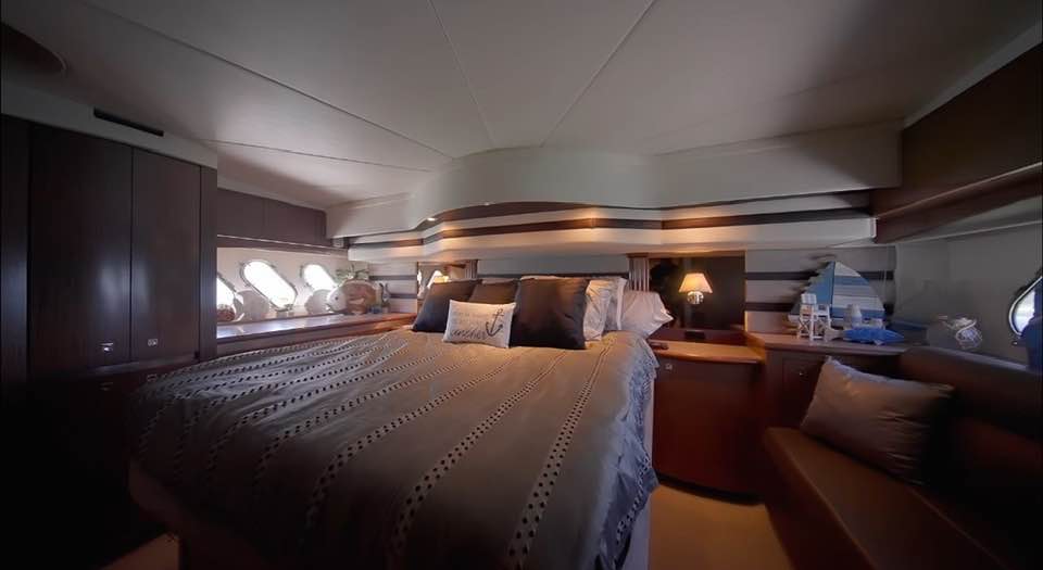 Cruiser Yachts 60 master cabin with queen berth and en-suite storage