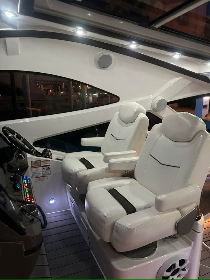 Cruiser Yachts 60 helm station with dual captain chairs and full electronics