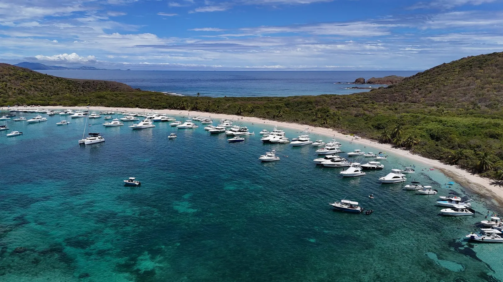 Aerial drone view of multiple private yachts anchored at Culebra Island Puerto Rico