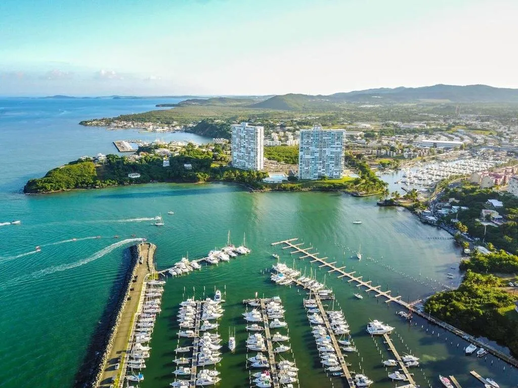 Wide aerial of Villa Marina, Fajardo, with twin condo towers