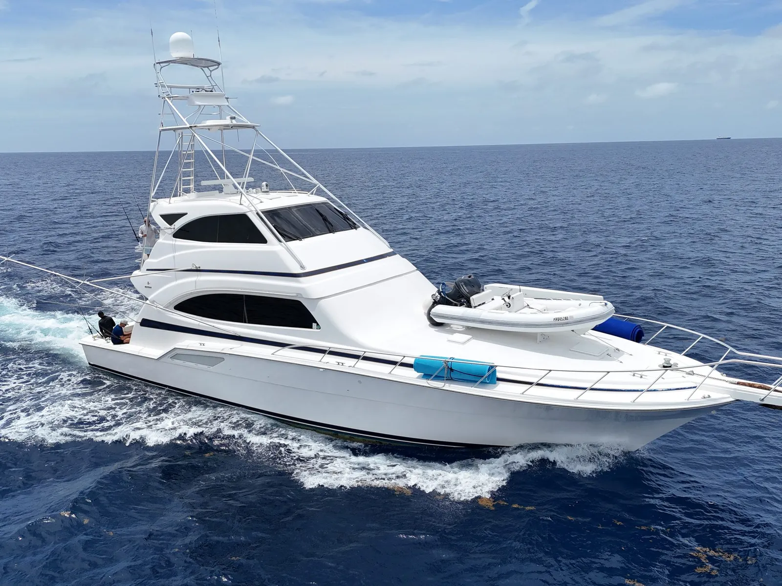 Bertram 70ft sportfisher underway at sea off Puerto Rico, aerial view