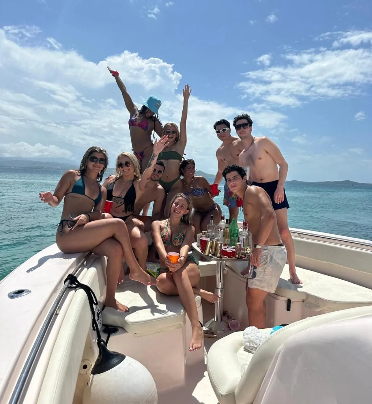 Group of friends celebrating on the Grady White 38