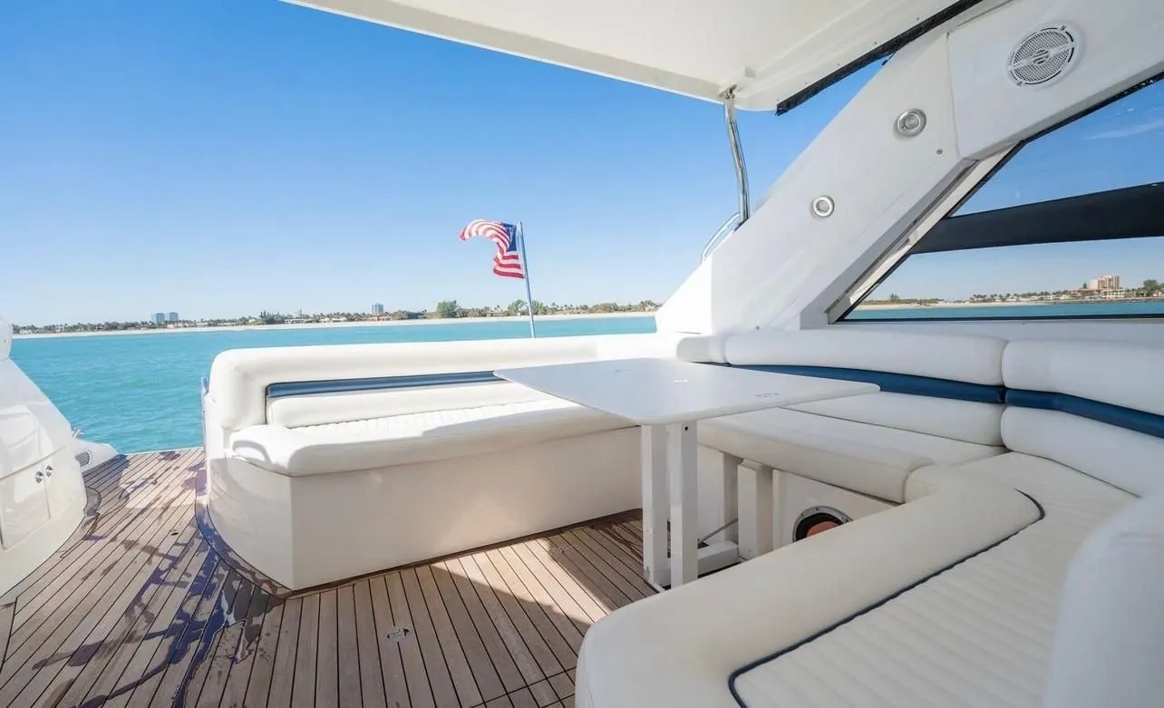 Sunseeker 60 aft dining area with teak deck