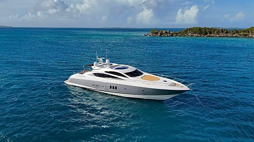 Sunseeker 82ft luxury yacht anchored in turquoise Caribbean water