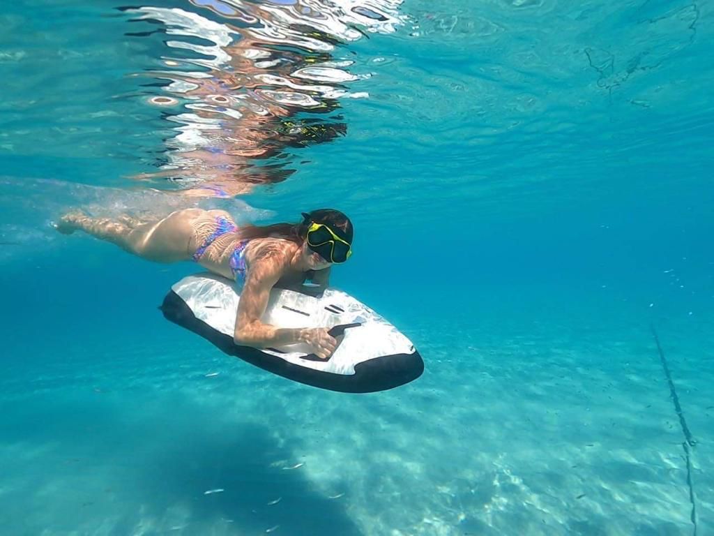 Seabob underwater scooter glide in clear Caribbean water
