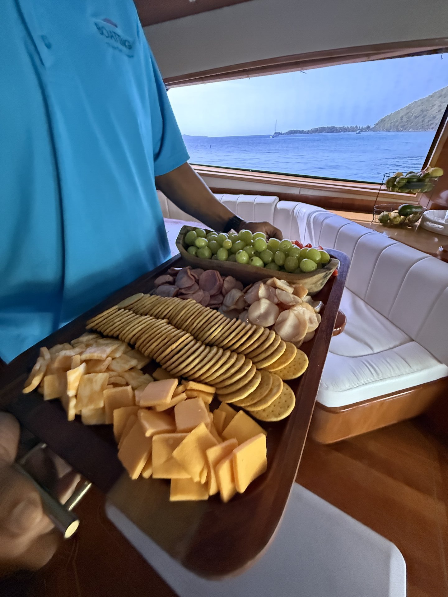 Snacks and fresh fruit prepared for guests aboard a private charter